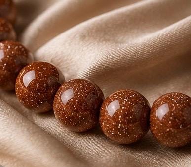 Starlit Ember Goldstone Crystal Bracelet Collection