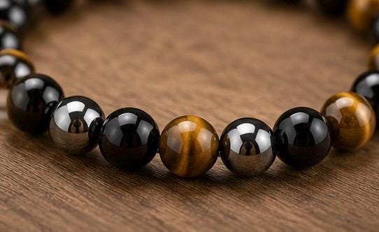 Triple pertection bracelet Black obsidian, gold tigers eye, and hematite